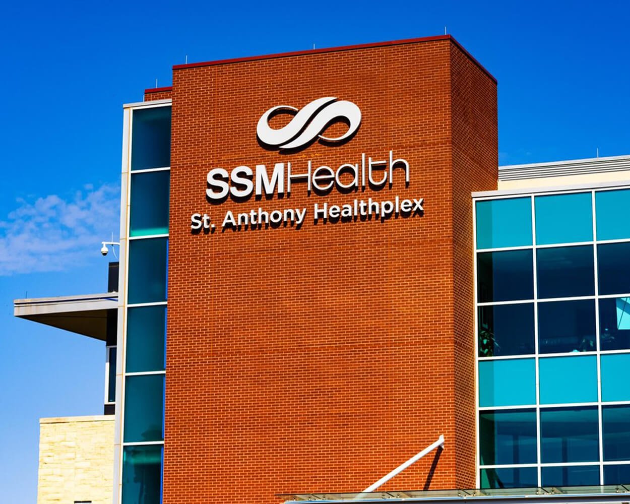Large exterior outdoor halo lit channel letters installed on brick building for SSM Health St. Anthony Healthplex in Oklahoma, City, Oklahoma.