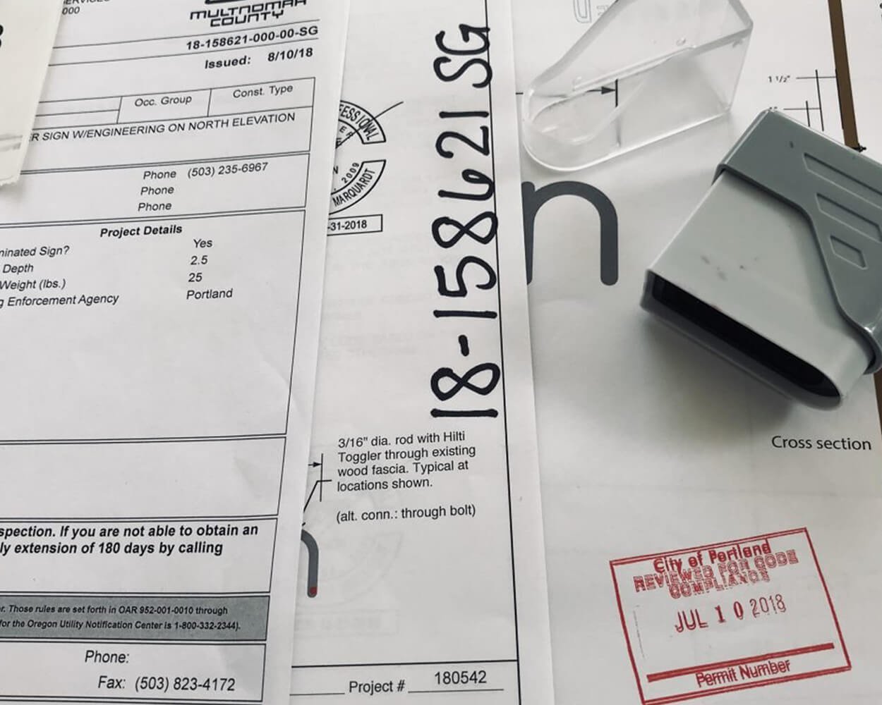 Generic image of paperwork stamped with a request for a permit number.