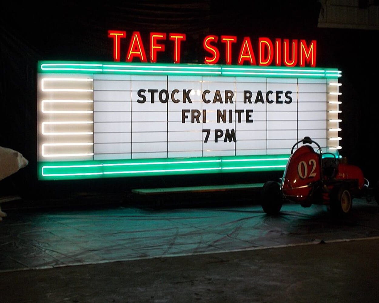 Restoration of the Taft Stadium marquee sign with real neon being shown all lit up.